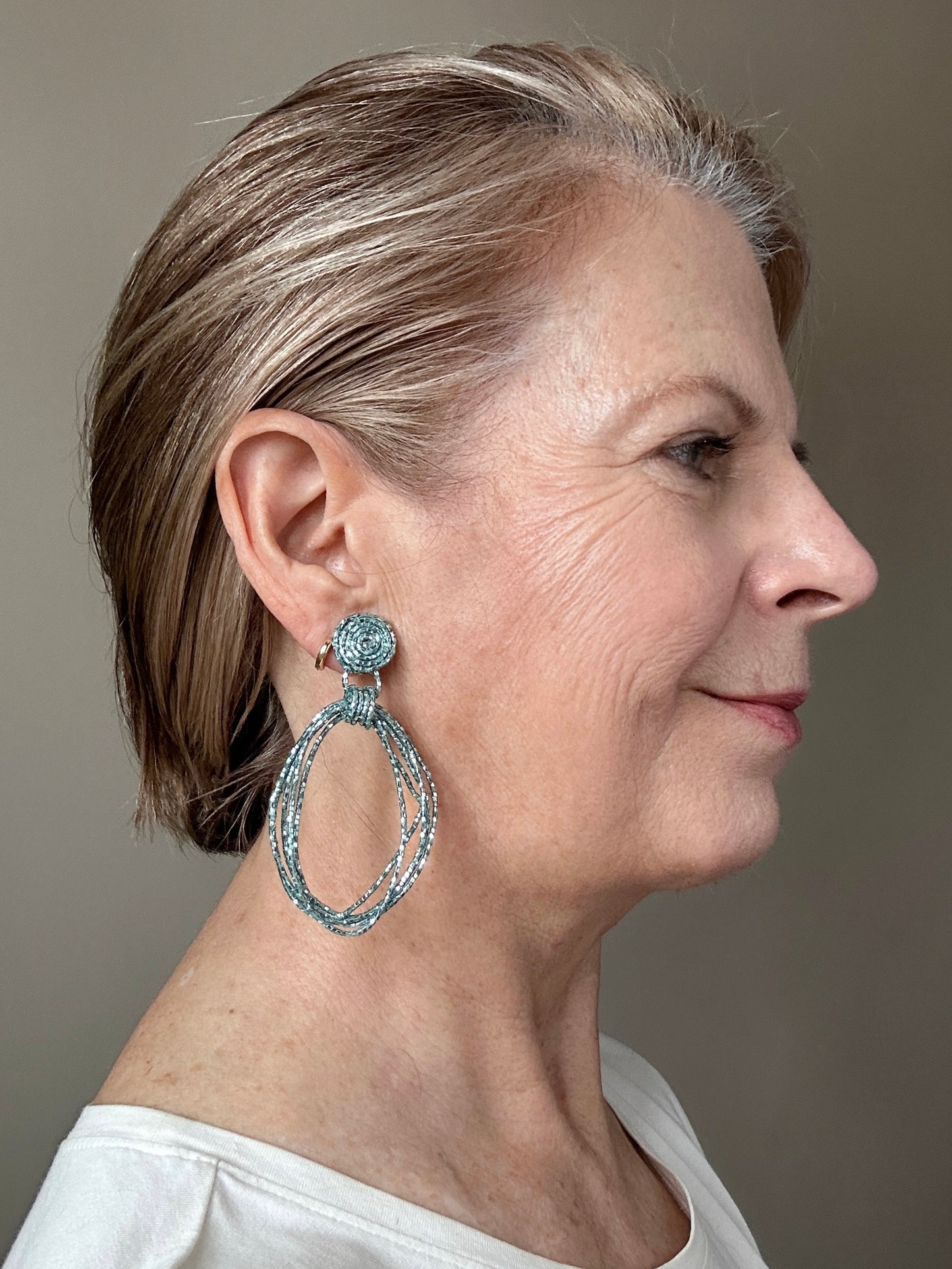 Teal beaded cord loop earrings