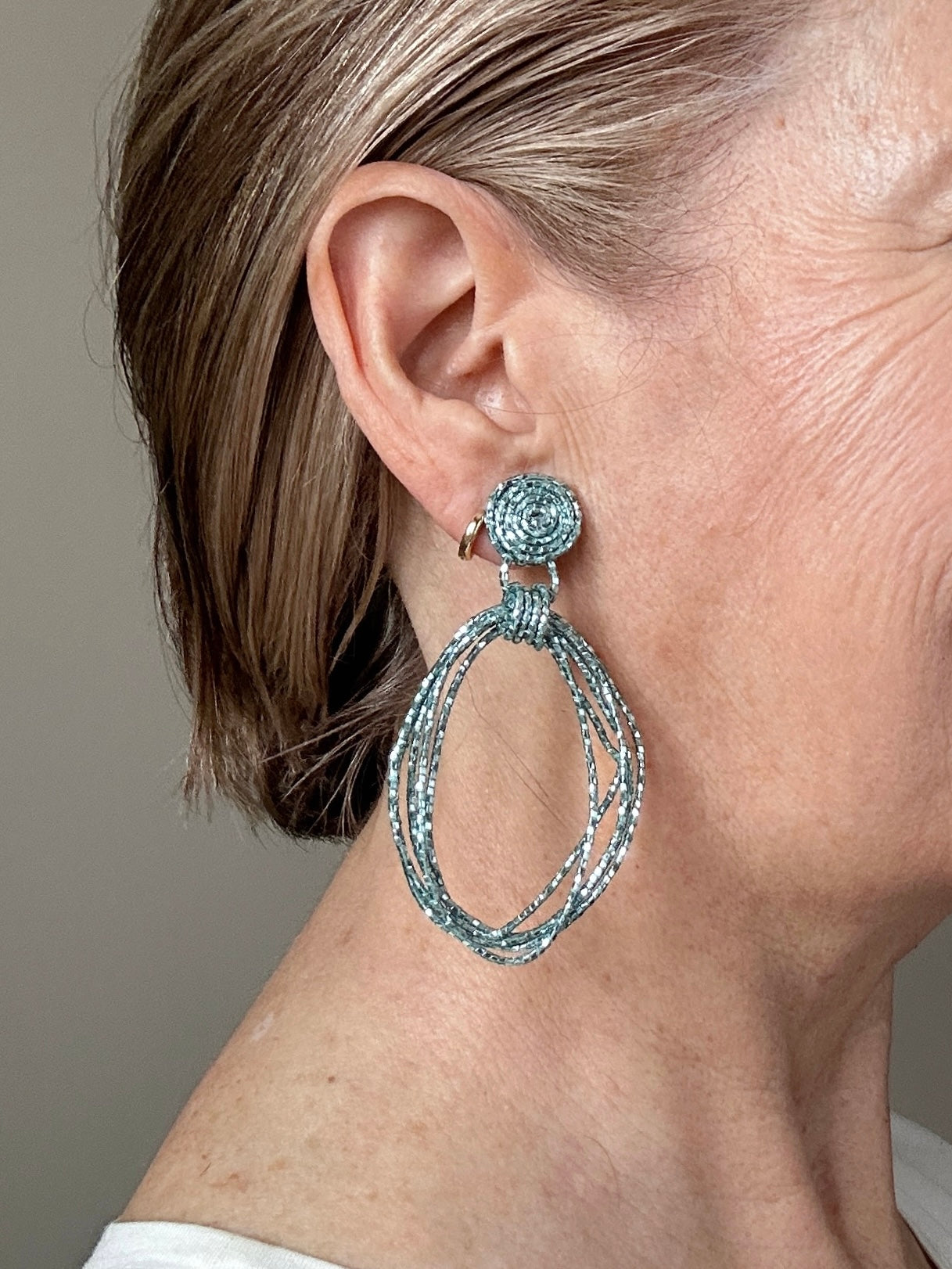 Teal beaded cord loop earrings